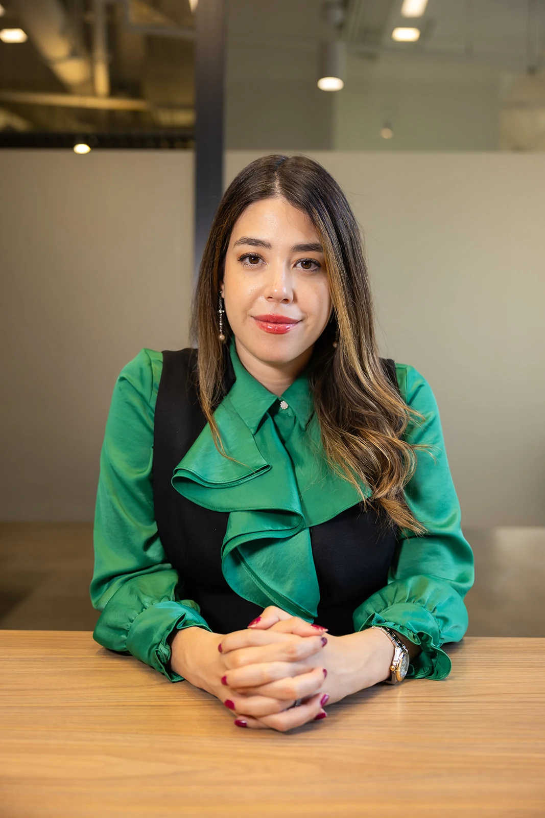Eloisa Pino seated in the Orlando office.